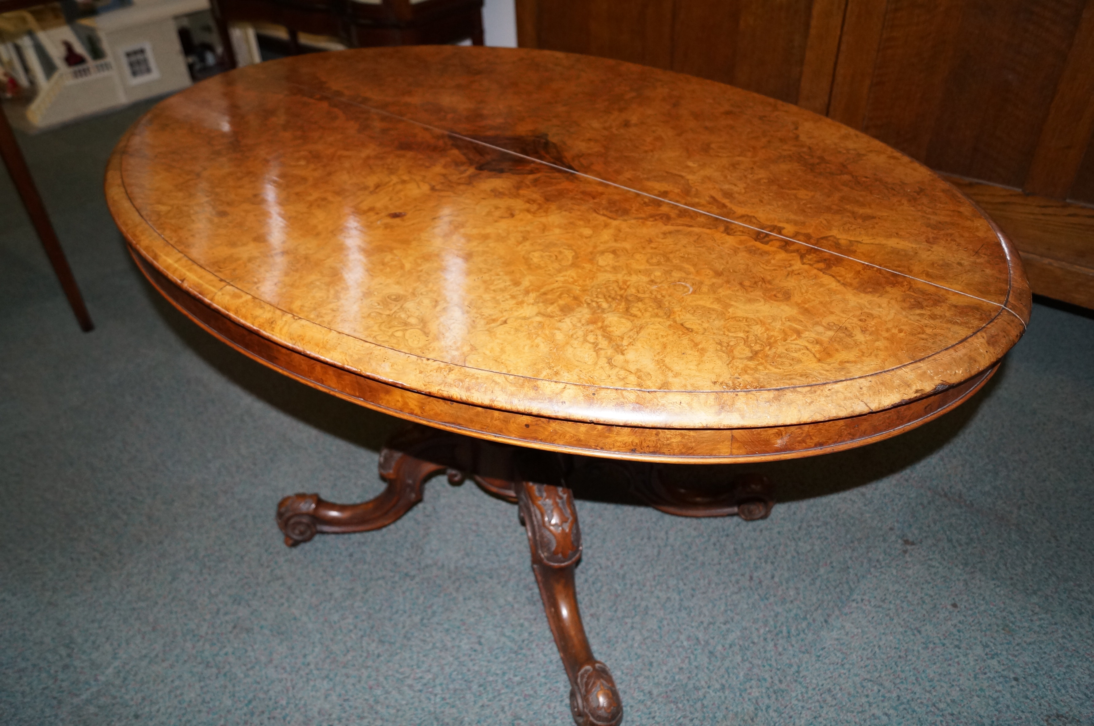 Victorian figured walnut tilt-top table, moulded t