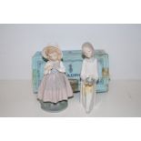 Nao figure of a girl together with a Lladro figure