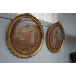 A pair of circular guilt framed pictures