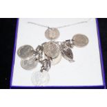 Silver necklace, pendant and bracelet set with coi