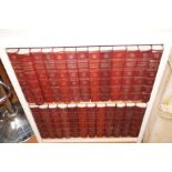 Collection of Brittania books with bookcase