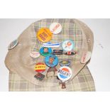 Cap with various vintage badges to include Golly,