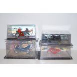 Four collectable Batman model motorcycles