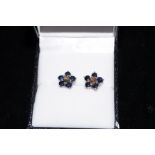 Pair of silver and black sapphire earrings