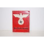 Cast iron sign depicting swastika, 20cm x 16cm