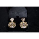 Pair of silver topaz and peridot earrings