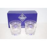 Two ebony crystal whiskey glasses