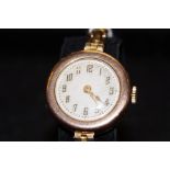 9ct gold cased ladies trench watch with a metal co