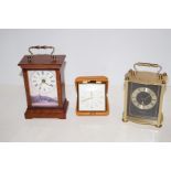 Two courier clocks and a travel clock