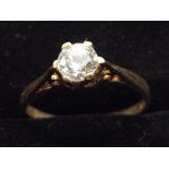 9ct Gold ring set with solitaire white stone. Size