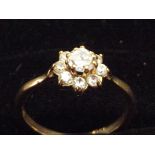 9ct Gold dress ring set with central white stone s