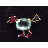 Unusual yellow metal pin brooch with three red gem