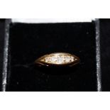 18ct gold ring set with 5 diamonds. Size R