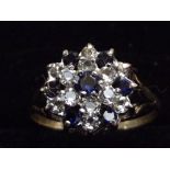 9ct Gold cluster ring with blue and white gem ston