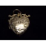 9ct gold heart shaped locket pendent
