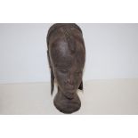 Very heavy African carved head of a woman