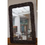 Carved oak mirror