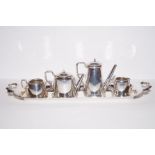 Silver four piece doll's house tea service with as