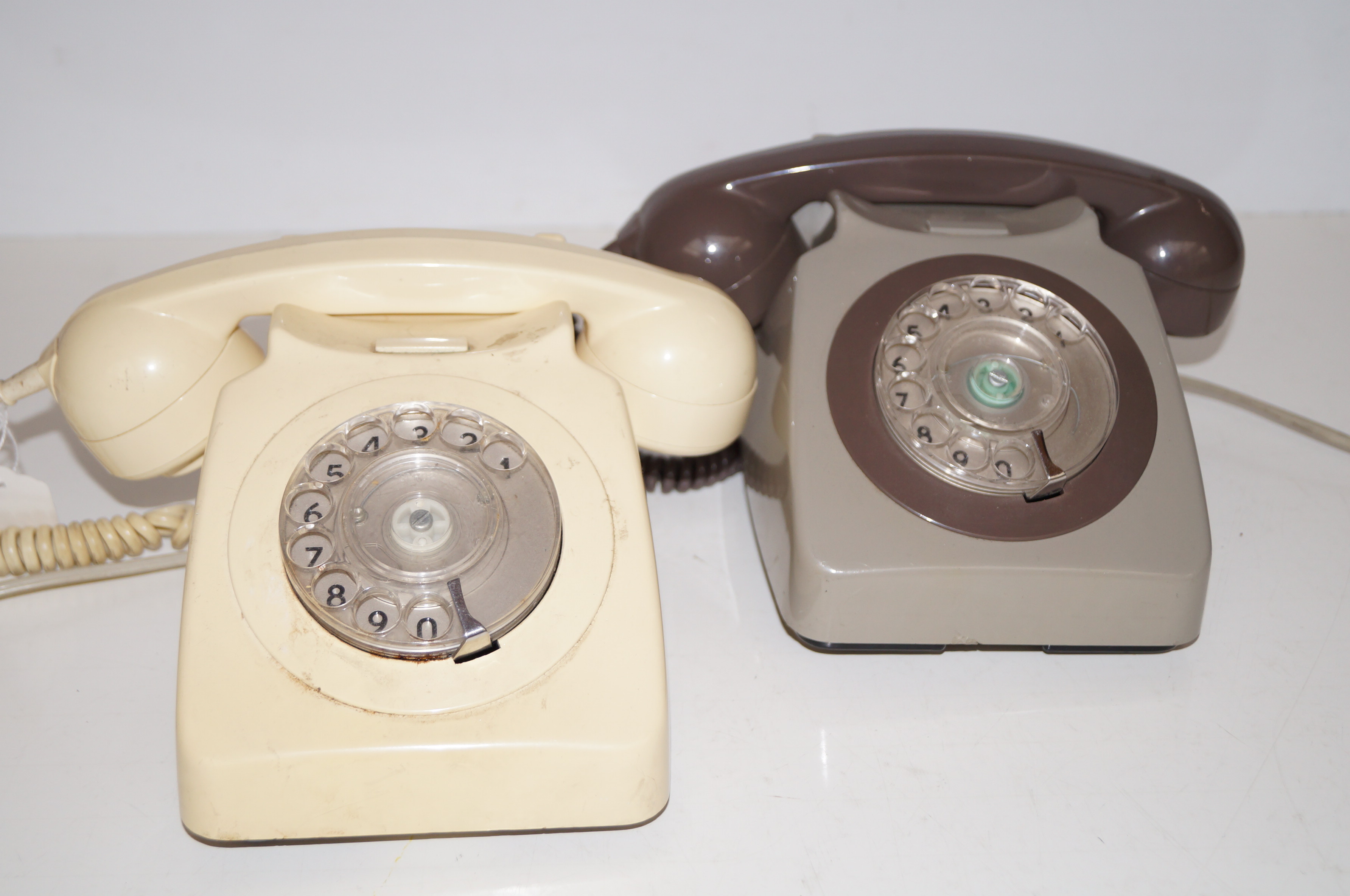 Two dial telephones