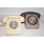 Two dial telephones