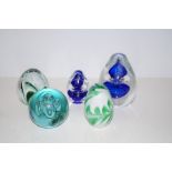 Five paperweights