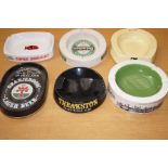 Collection of six pub wade ashtrays