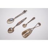 Three continental silver spoons together with a co