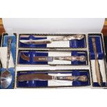 Group of silver handled flatware, grapefruit knife