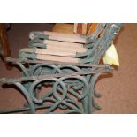 six cast iron bench ends and a cast iron table end