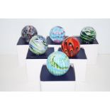 Six boxed paperweights