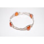 800 grade silver bangle set with orange gemstones