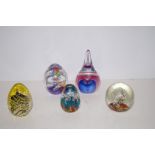 Five paperweights