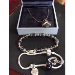 Charm bracelet, bracelet and a wedgwood necklace