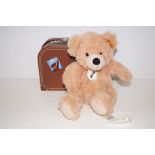 Steiff teddy bear called Fynn with gold stud and imitation suitcase