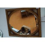 Gilt framed wall mirror