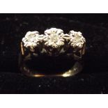 9ct gold ring set with 3 white stones Size k.5