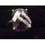 925 Silver dress ring set with large purple stone