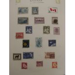 Stamp album containing many Canadian stamps