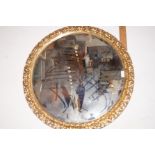 Gilt framed circular mirror