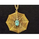 Yellow metal spider pendent with chain. Pendent we