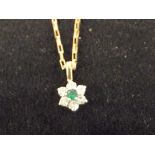 9ct Gold chain and pendent set with central green