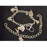 Silver charm bracelet and one other. Total weight