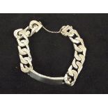 Silver ID bracelet with safety chain. Weight 60g