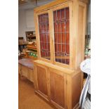 Early 20th century bookcase with leaded lights