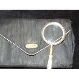 Early magnifying glass with bone handle in associa