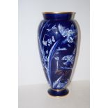 Early 20th century blue and white molded vase with