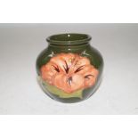 Moorcroft small vase with hibiscus design. 8cm hig