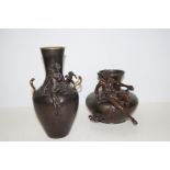 Two figural spelter vases. Largest 27cm