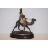 Cold painted bronze group, Arab on camel. Height 3