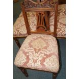 Six matching Edwardian chairs.